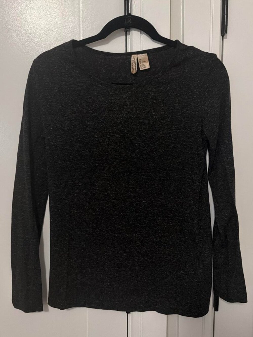 Gray long sleeve top with subtle heathered texture
